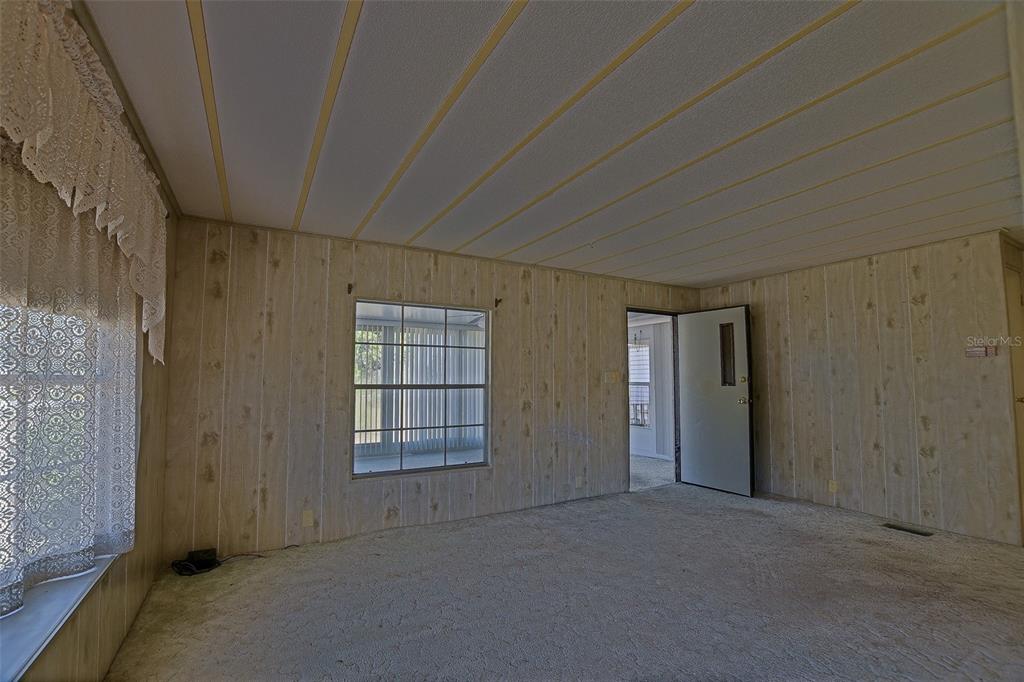 7452 Southeast 135th Street Summerfield, FL 34491 - Photo 27 of 43 an empty room with windows