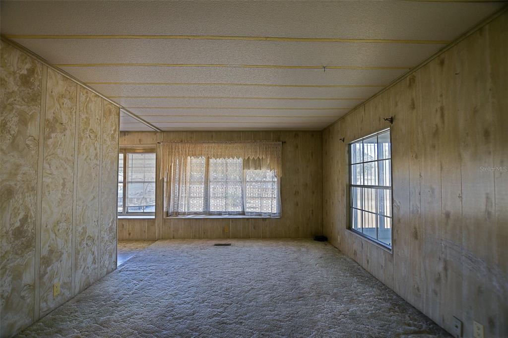 7452 Southeast 135th Street Summerfield, FL 34491 - Photo 28 of 43 a view of an empty room with a window