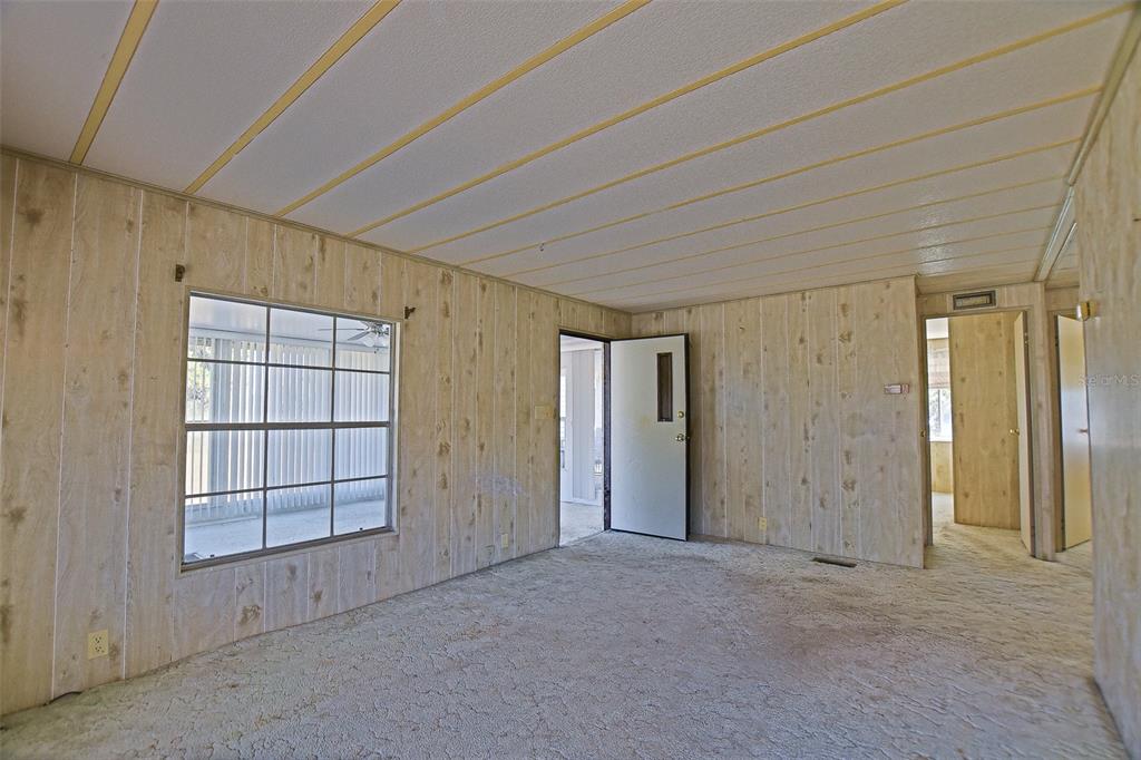 7452 Southeast 135th Street Summerfield, FL 34491 - Photo 29 of 43 an empty room with windows