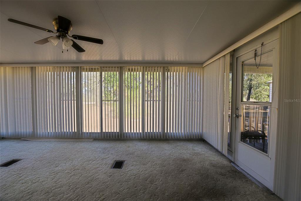 7452 Southeast 135th Street Summerfield, FL 34491 - Photo 30 of 43 a view of an empty room with a window