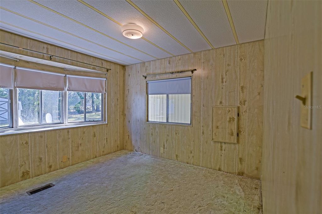 7452 Southeast 135th Street Summerfield, FL 34491 - Photo 37 of 43 a view of an empty room with a window