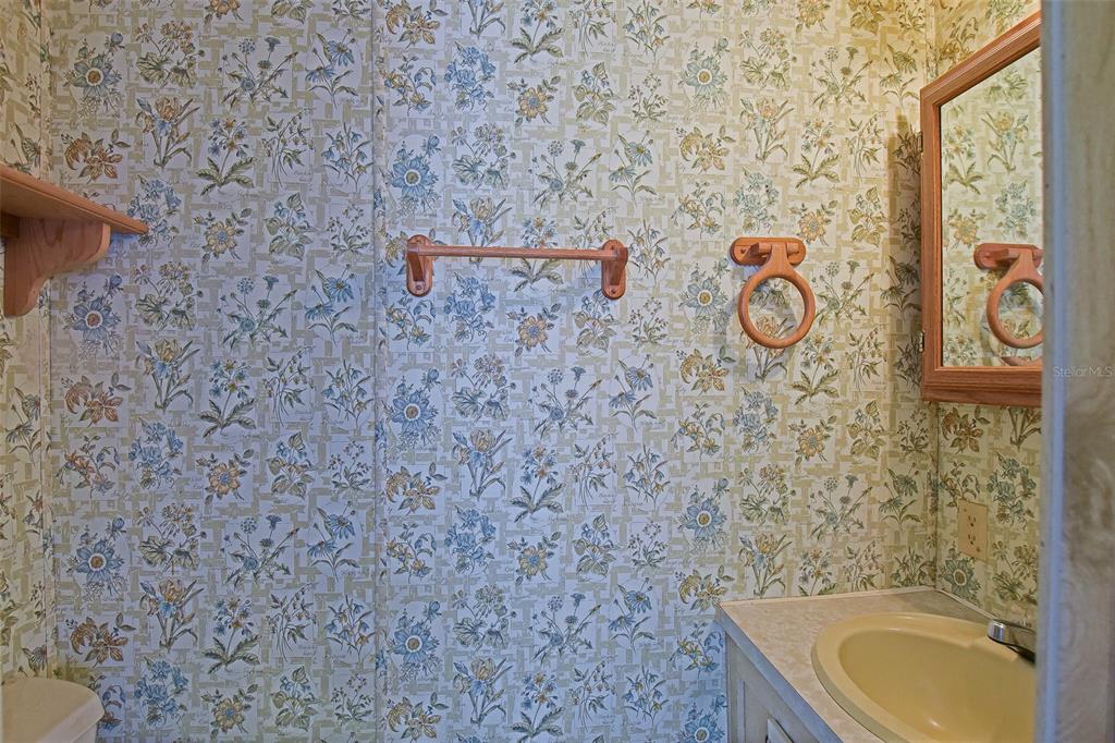 7452 Southeast 135th Street Summerfield, FL 34491 - Photo 43 of 43 a bathroom with a toilet and a sink