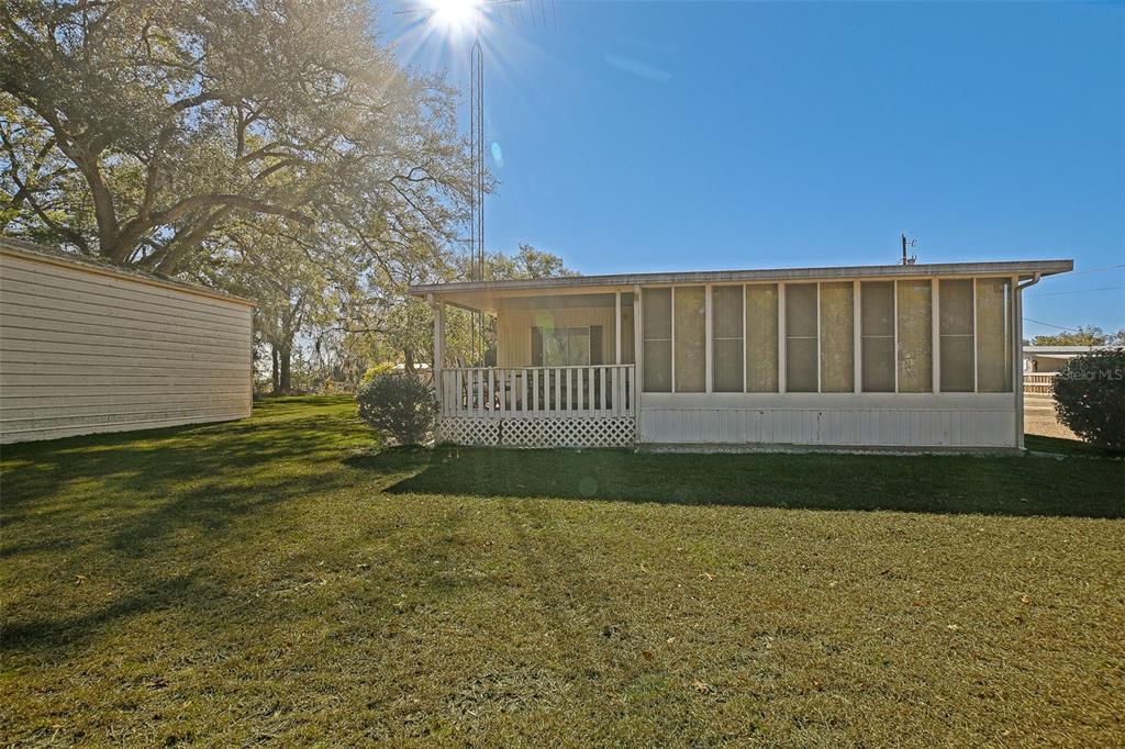 7452 Southeast 135th Street Summerfield, FL 34491 - Photo 5 of 43 a view of a house with a yard