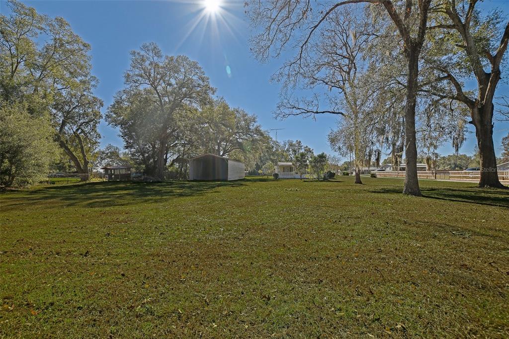 7452 Southeast 135th Street Summerfield, FL 34491 - Photo 6 of 43 a view of outdoor space with garden view