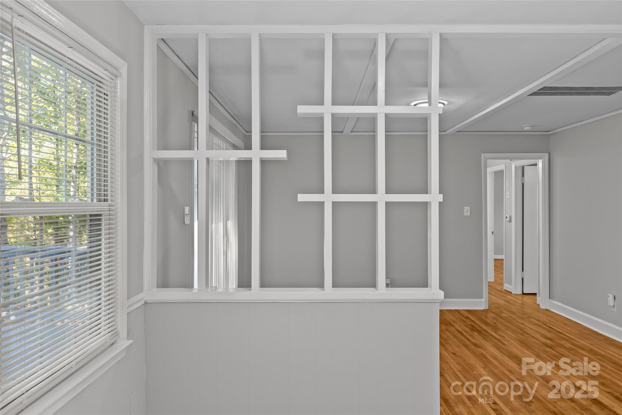 8341 Reedy Creek Road Charlotte, NC 28215 - Photo 28 of 40 a view of an empty room with a window