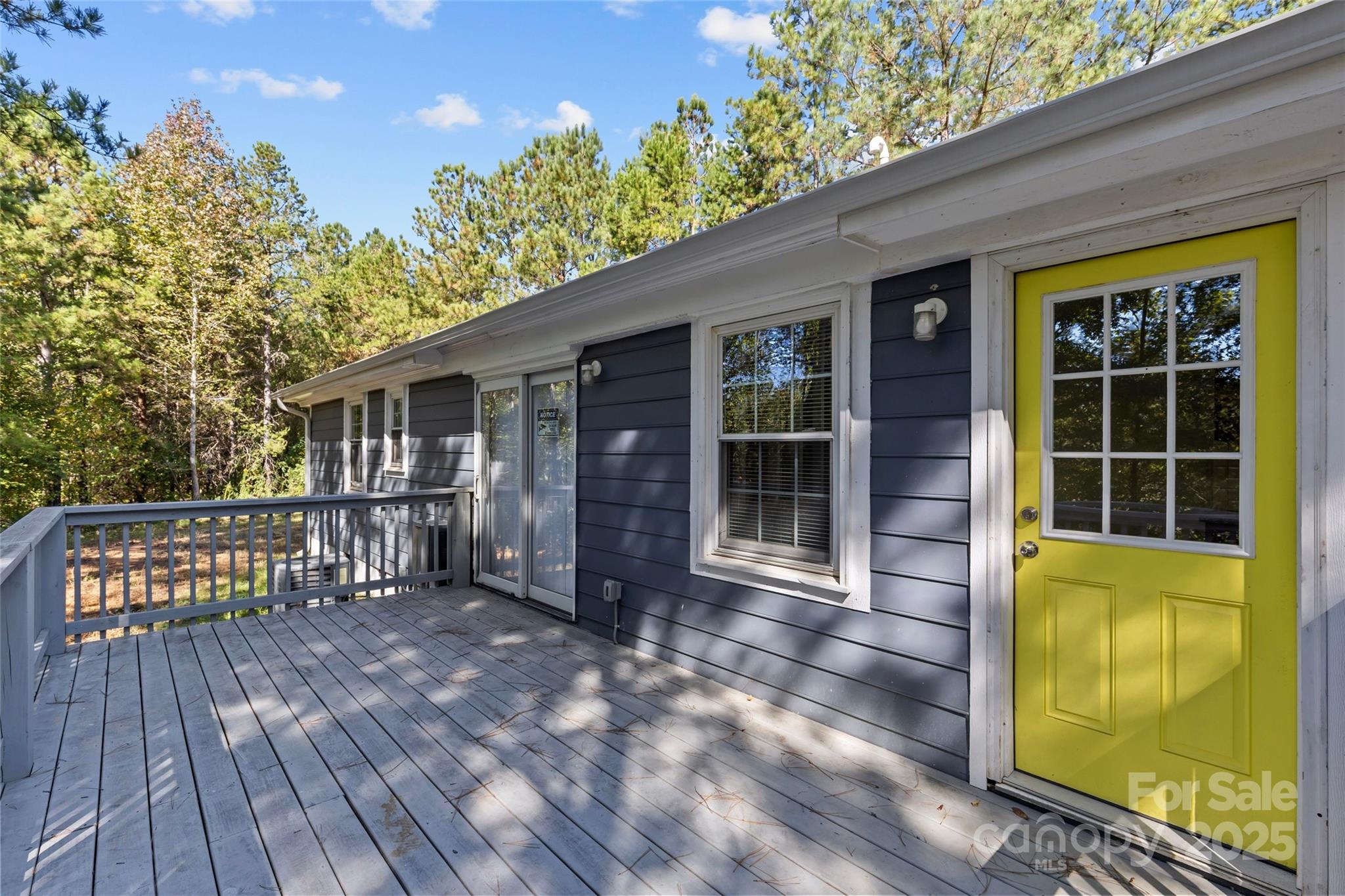 8341 Reedy Creek Road Charlotte, NC 28215 - Photo 35 of 40 a view of front door with wooden floor