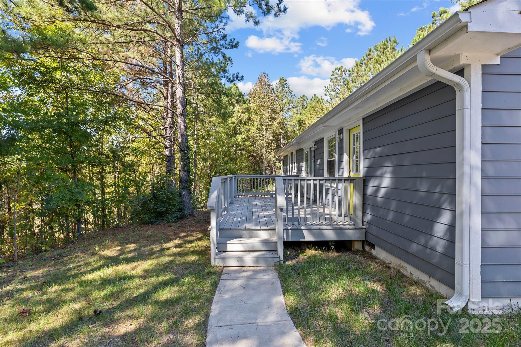8341 Reedy Creek Road Charlotte, NC 28215 - Photo 36 of 40 a view of a house with a small yard