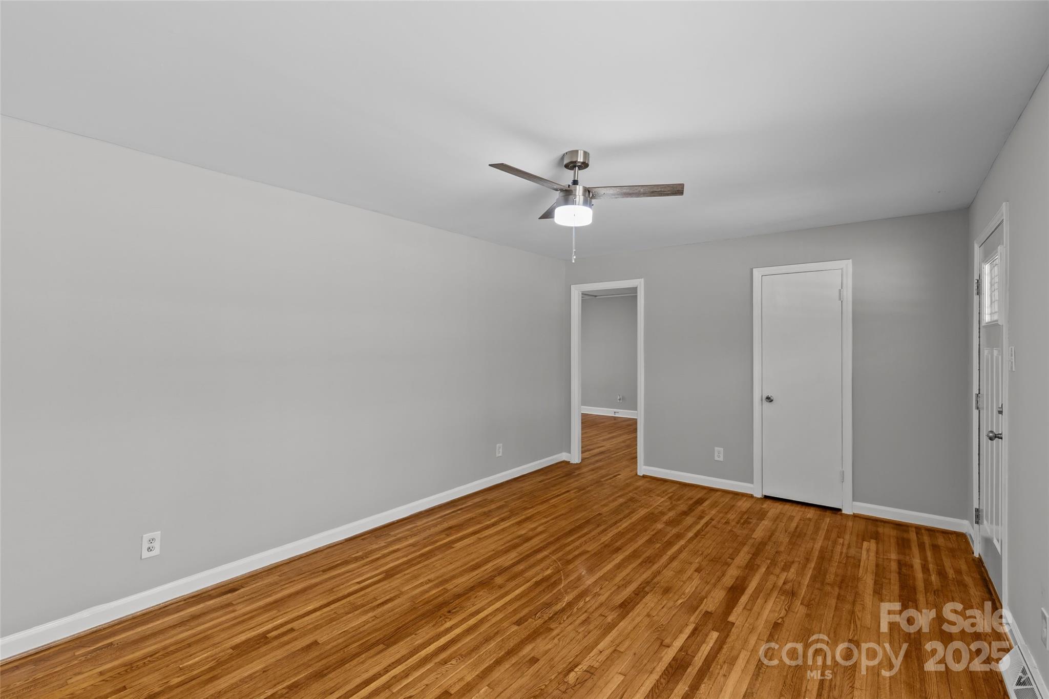8341 Reedy Creek Road Charlotte, NC 28215 - Photo 10 of 40 wooden floor in an empty room