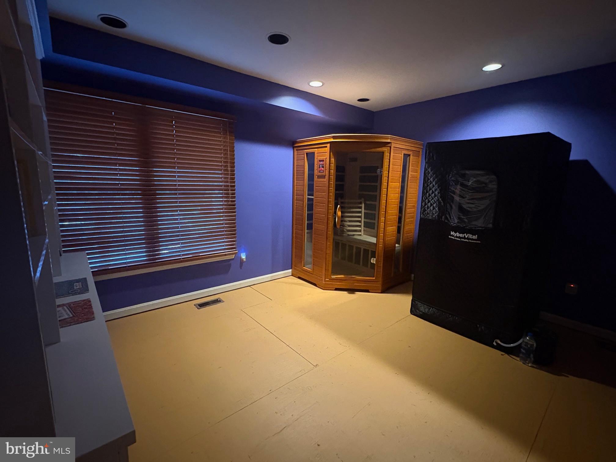 23 Raisin Tree Circle Baltimore, MD 21208 - Photo 2 of 10 a view of an empty room with a window