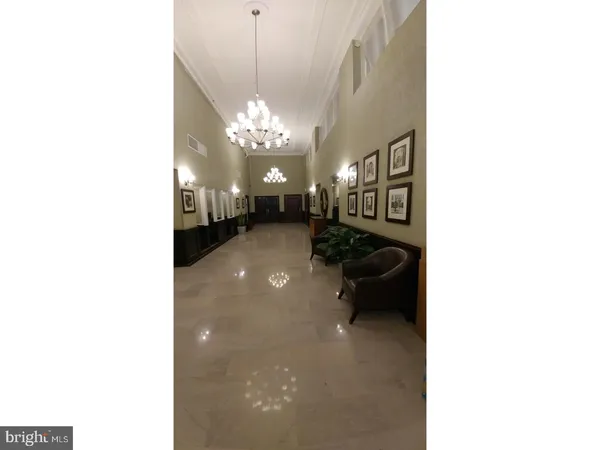 a view of a living room with a chandelier