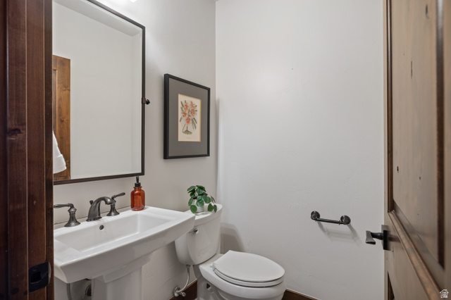 707 Chimney Rock Road, Unit 247 Heber City, UT 84032 - Photo 36 of 64 Half bath featuring toilet and a sink