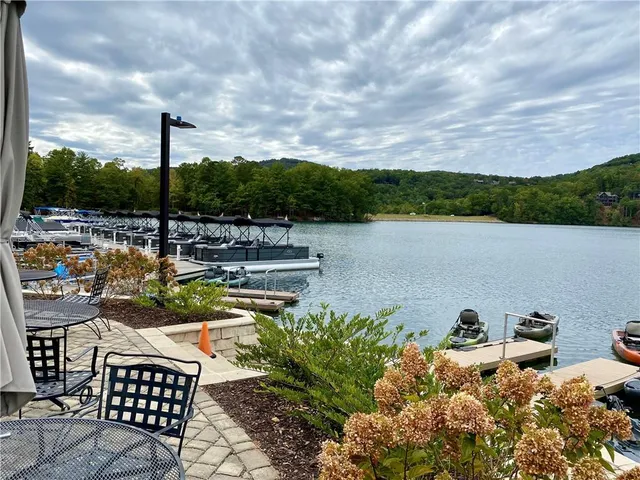 a view of a lake with couches
