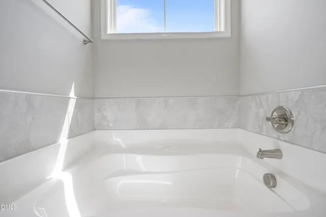 a bathroom with a bathtub