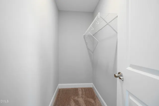 a view of kitchen sink and cabinet