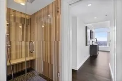 a view of a bathroom from a hallway