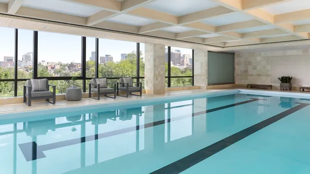 a view of a kitchen with a large window
