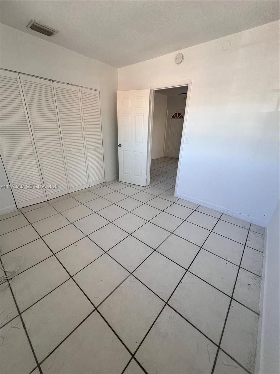 608 Southwest 15th Avenue, Unit 2 Miami, FL 33135 - Photo 18 of 22 a view of a garage