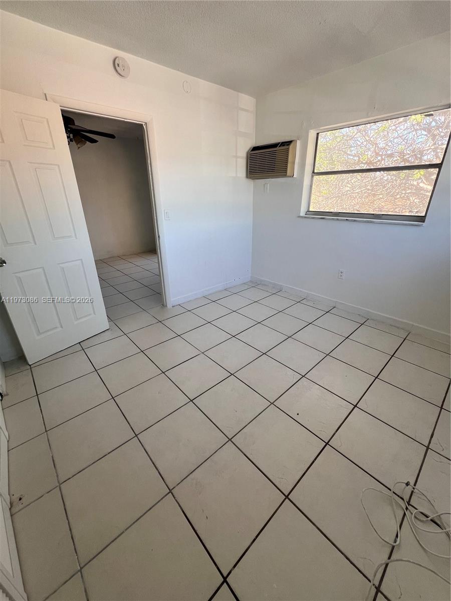 608 Southwest 15th Avenue, Unit 2 Miami, FL 33135 - Photo 19 of 22 a view of a garage
