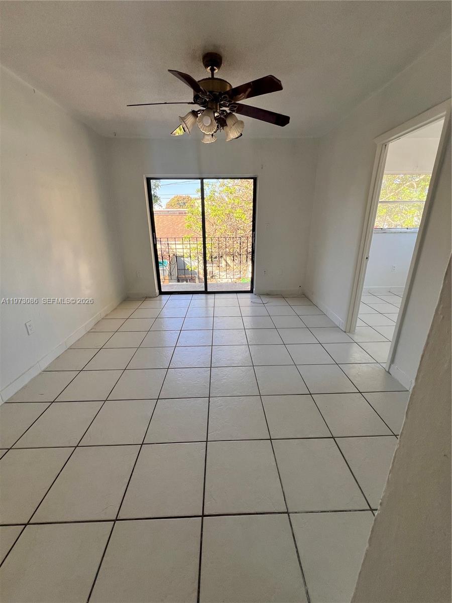 608 Southwest 15th Avenue, Unit 2 Miami, FL 33135 - Photo 2 of 22 a view of an empty room with a window