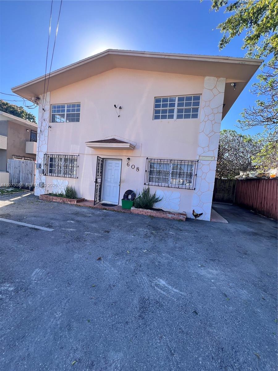 608 Southwest 15th Avenue, Unit 2 Miami, FL 33135 - Photo 22 of 22 a view of a house with a patio