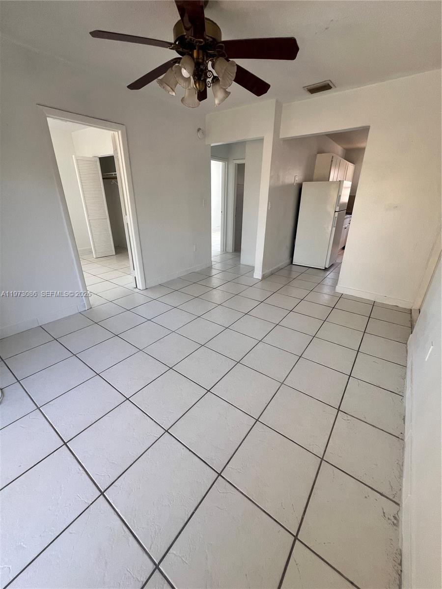 608 Southwest 15th Avenue, Unit 2 Miami, FL 33135 - Photo 5 of 22 a view of a livingroom with furniture and window