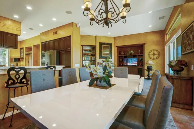 a view of a dining room with furniture
