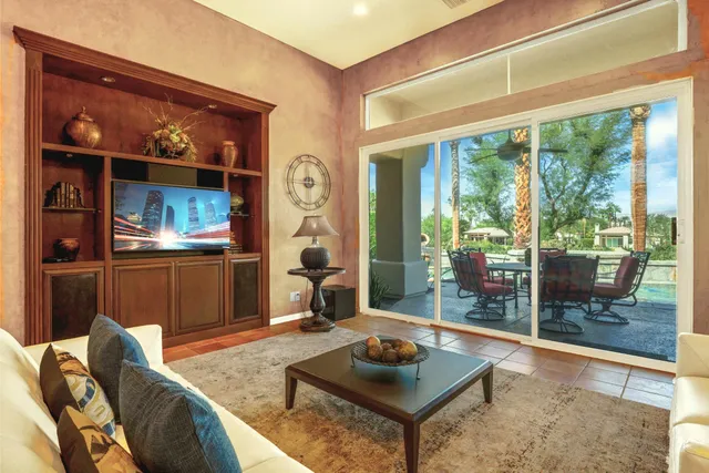 a living room with furniture and window