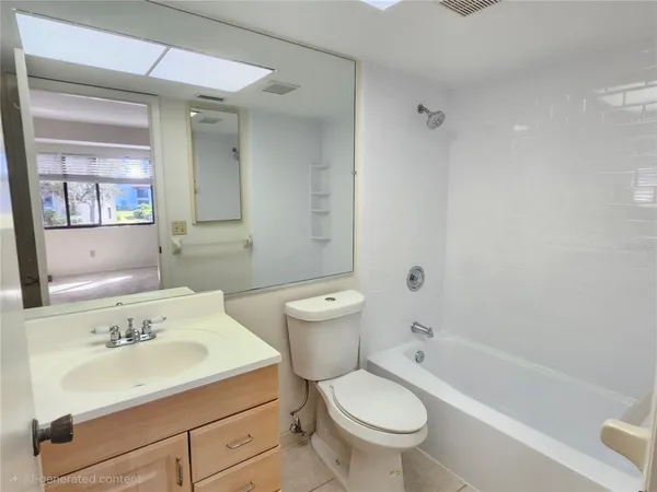 an empty room with closet and a chandelier fan
