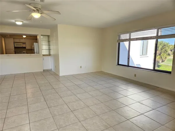 a view of an empty room and window