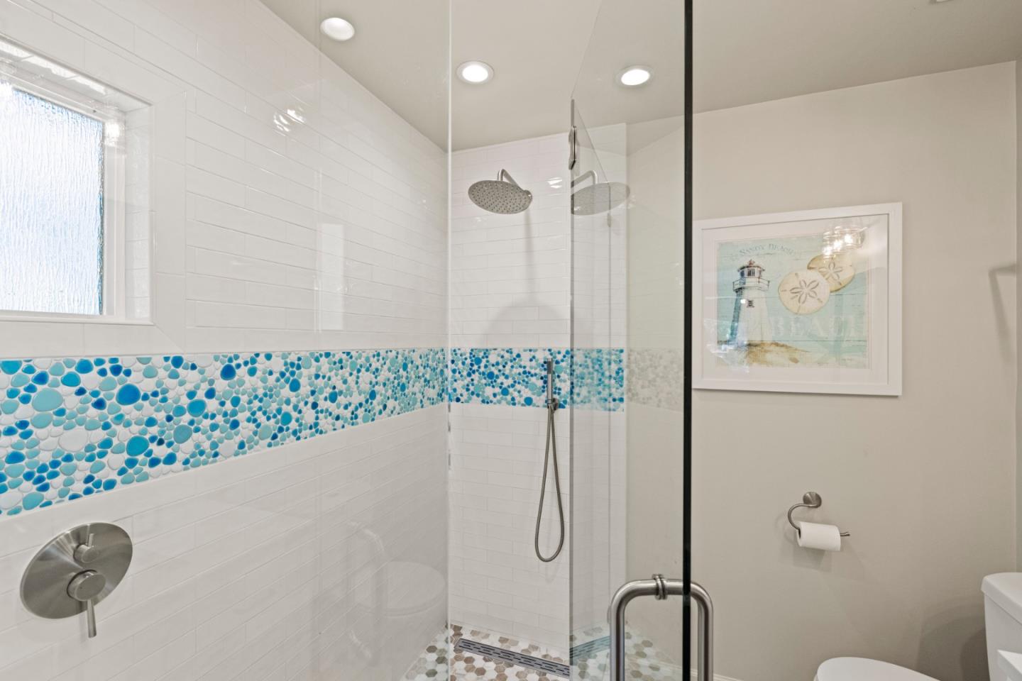 840 Filmore Street Monterey, CA 93940 - Photo 17 of 39 a bathroom with a bathtub and a shower