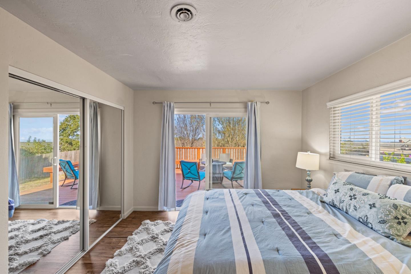 840 Filmore Street Monterey, CA 93940 - Photo 19 of 39 a bedroom with a bed and a large window
