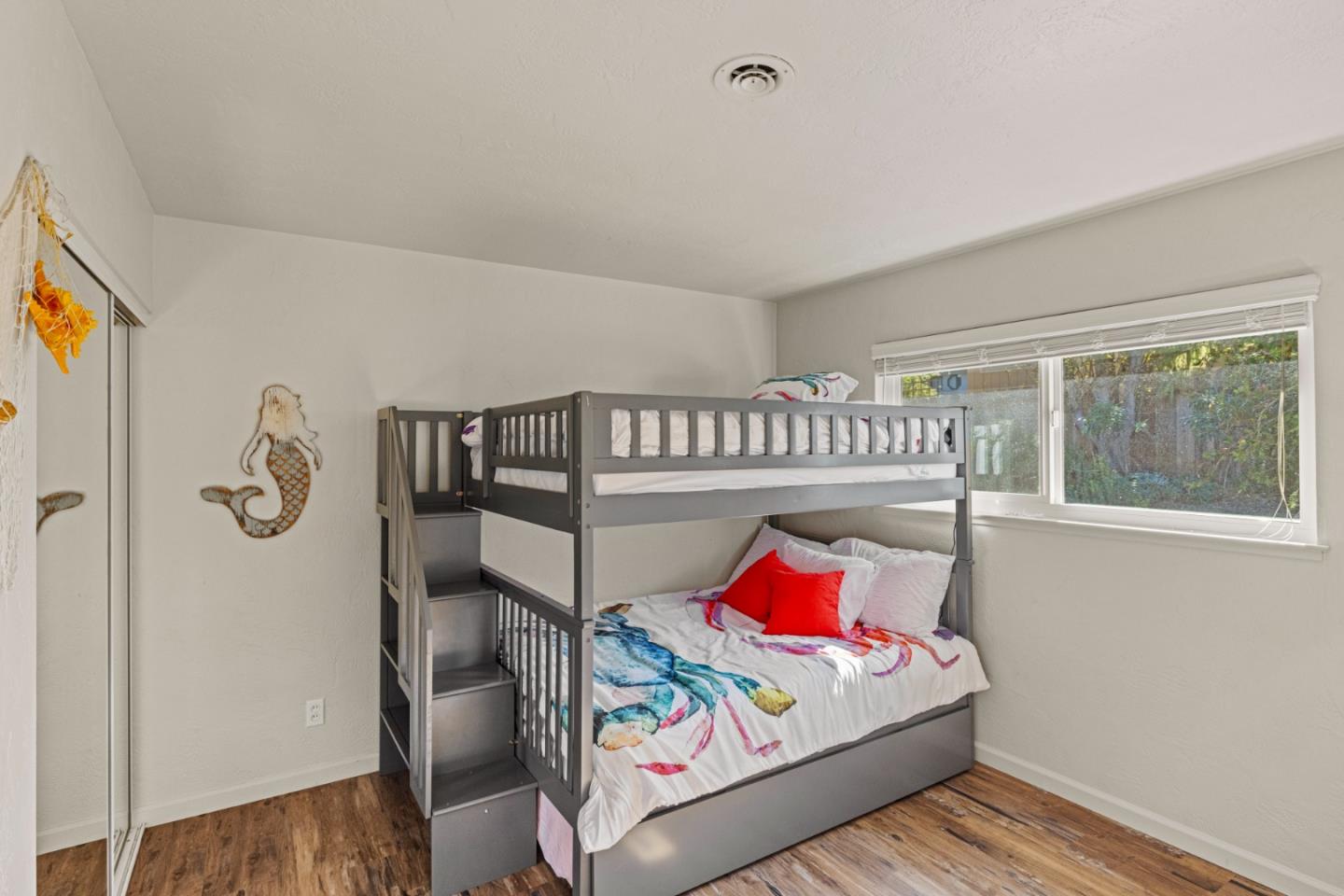 840 Filmore Street Monterey, CA 93940 - Photo 25 of 39 a bedroom with furniture and a window