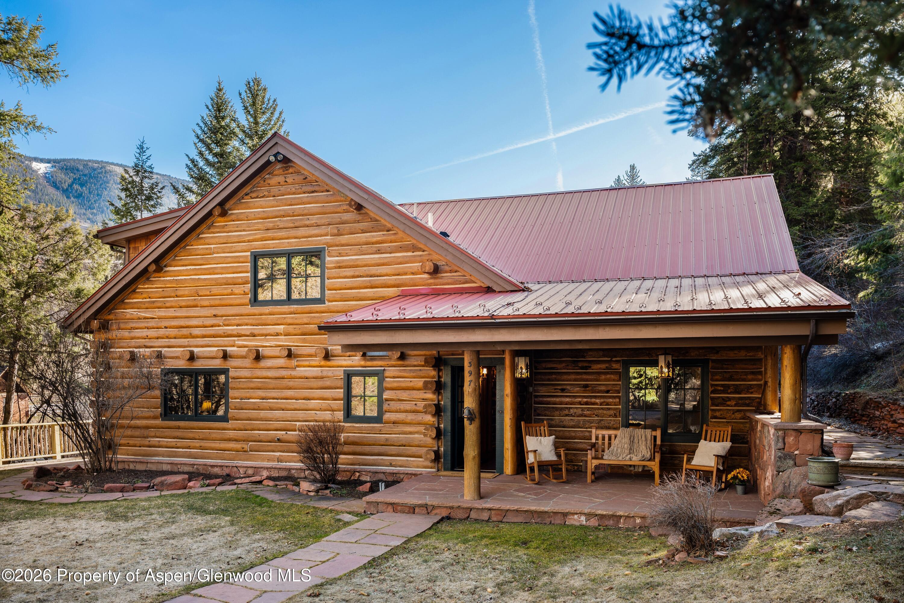 397 Oak Road Basalt, CO 81621 - Photo 2 of 32 a view of a house with outdoor seating area