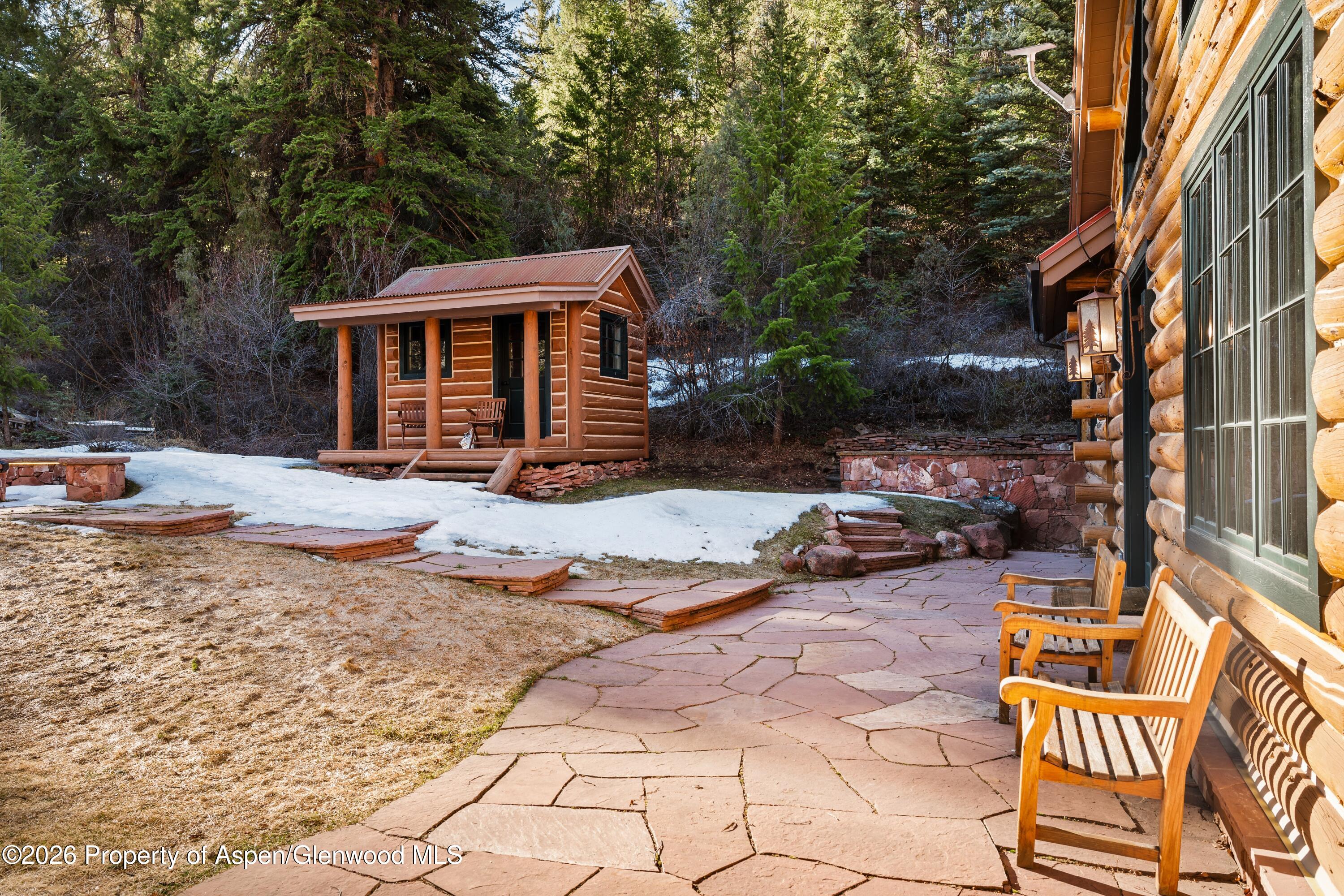 397 Oak Road Basalt, CO 81621 - Photo 26 of 32 a front view of a house with a yard