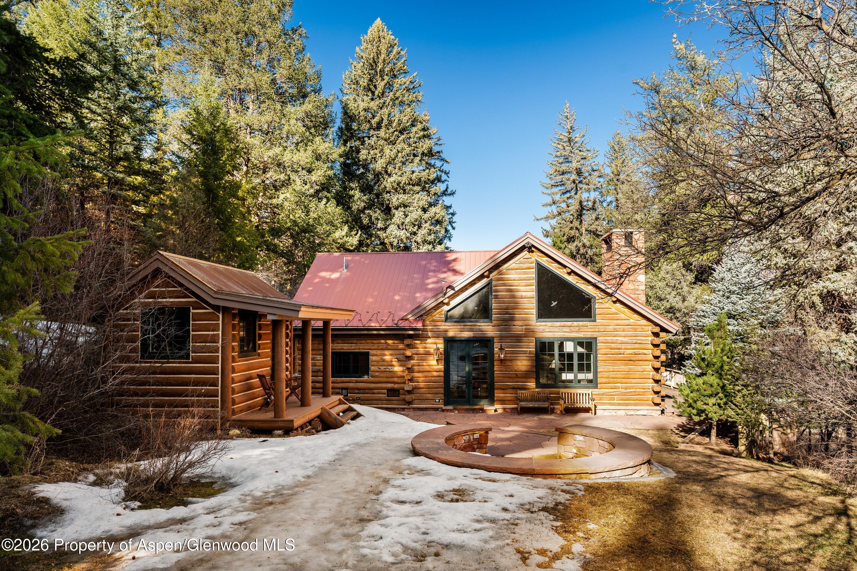397 Oak Road Basalt, CO 81621 - Photo 27 of 32 a front view of a house with a yard