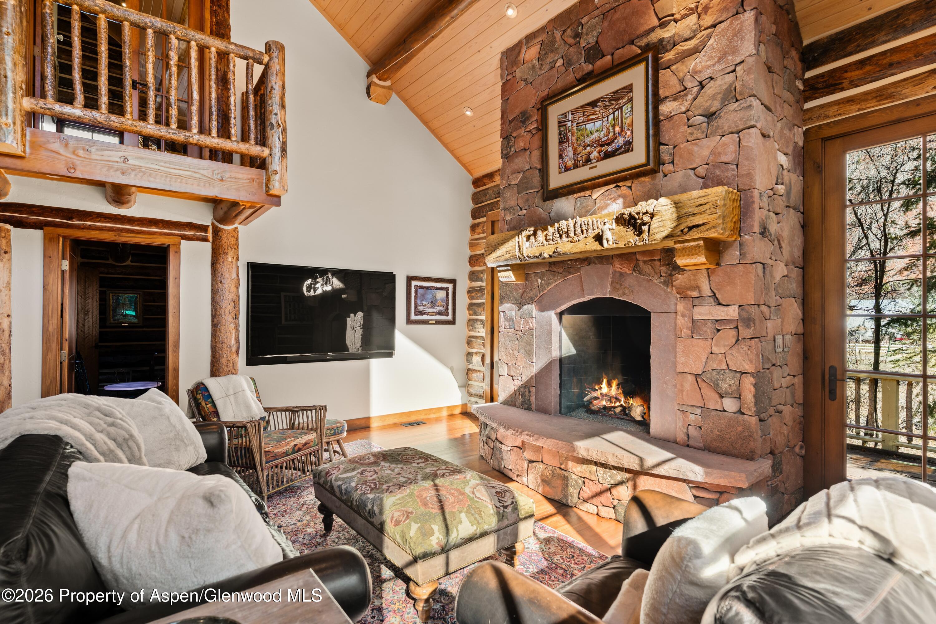 397 Oak Road Basalt, CO 81621 - Photo 9 of 32 a view of a livingroom with furniture and fireplace