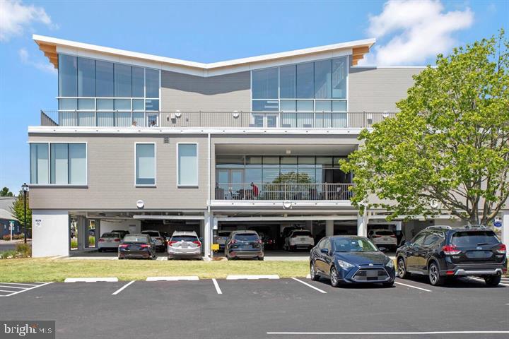 4037 7th Street North Beach, MD 20714 - Photo 12 of 54 a car parked in front of a building