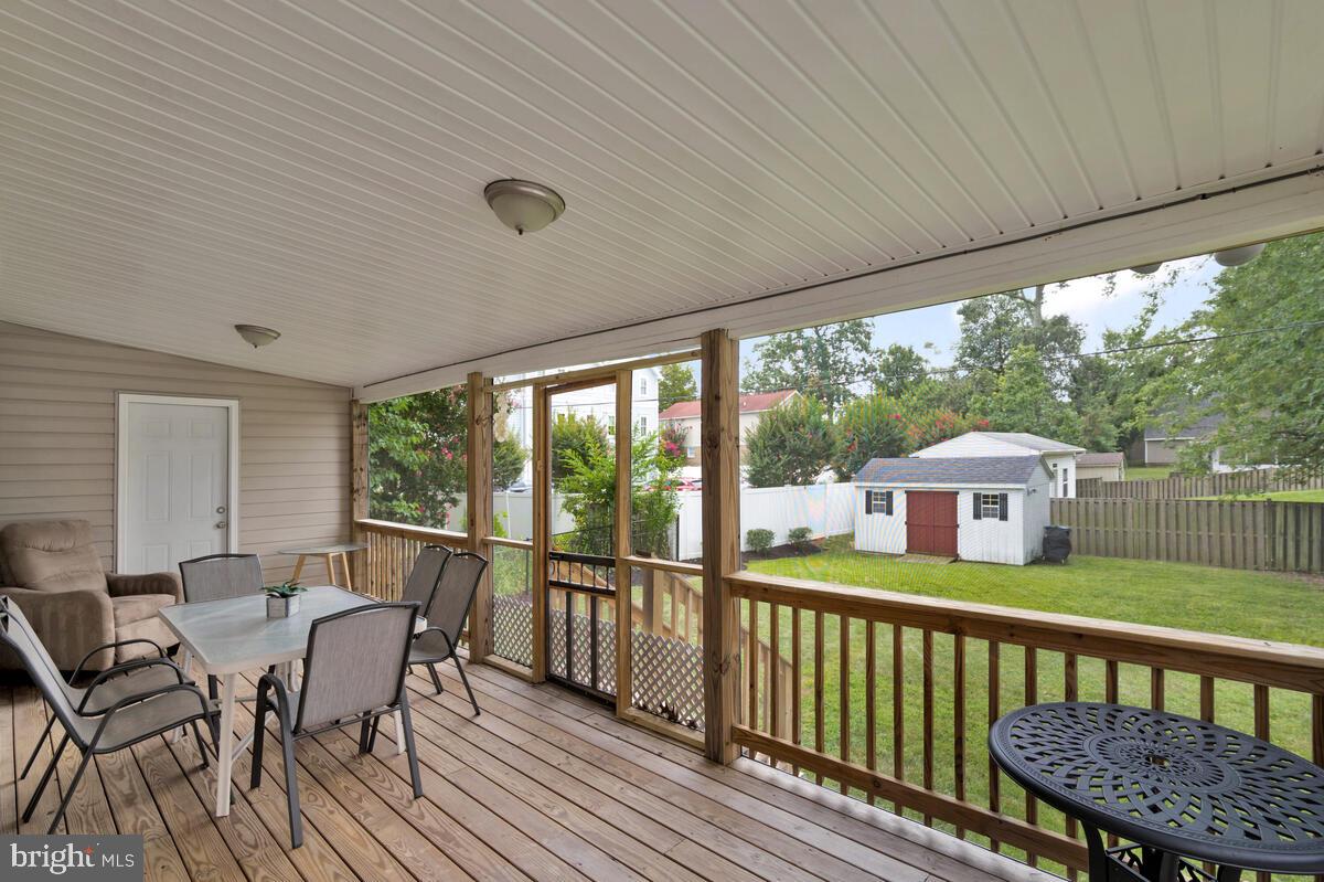 4037 7th Street North Beach, MD 20714 - Photo 4 of 54 a view of a two chairs in the roof deck