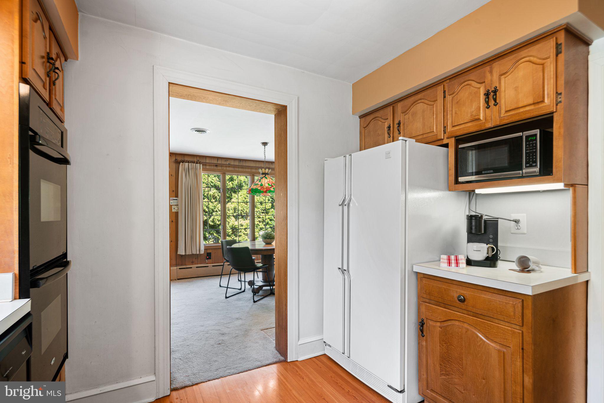 223 Hopkins Road Haddonfield, NJ 08033 - Photo 14 of 51 a kitchen with stainless steel appliances a refrigerator stove and microwave