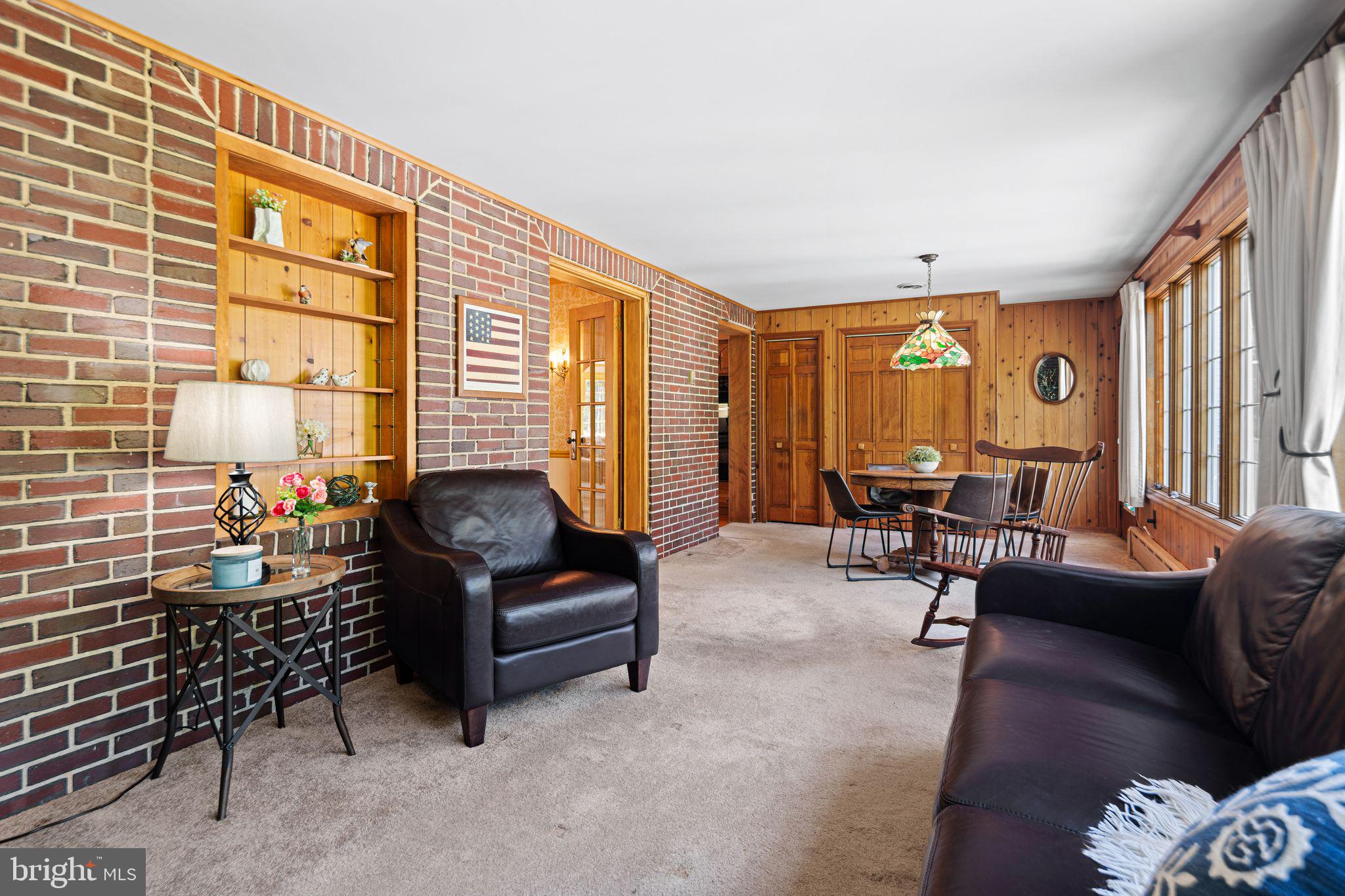223 Hopkins Road Haddonfield, NJ 08033 - Photo 15 of 51 a living room with furniture and a window
