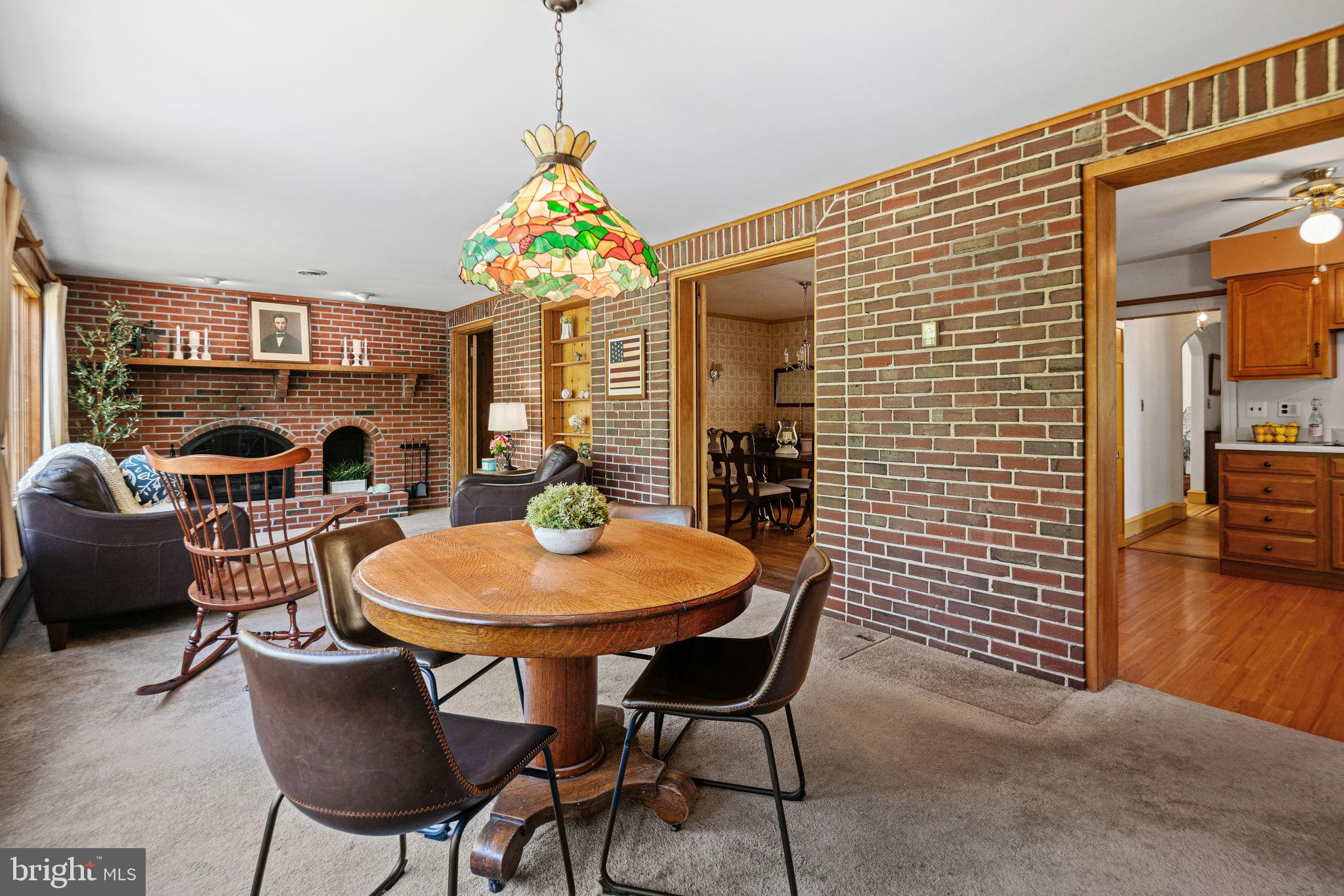 223 Hopkins Road Haddonfield, NJ 08033 - Photo 17 of 51 a view of a dining room with furniture window and wooden floor