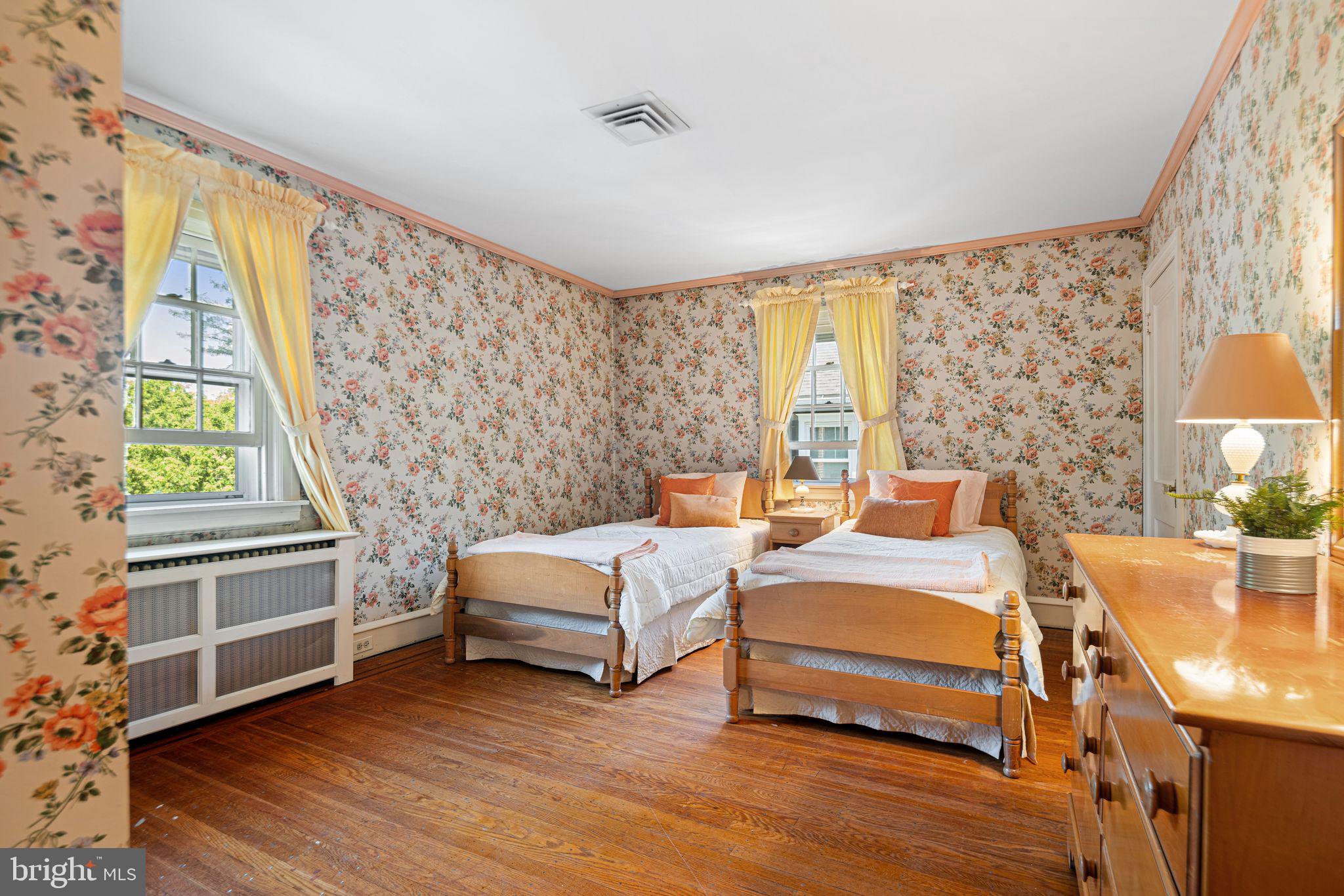 223 Hopkins Road Haddonfield, NJ 08033 - Photo 29 of 51 a bedroom with a bed and a night stand