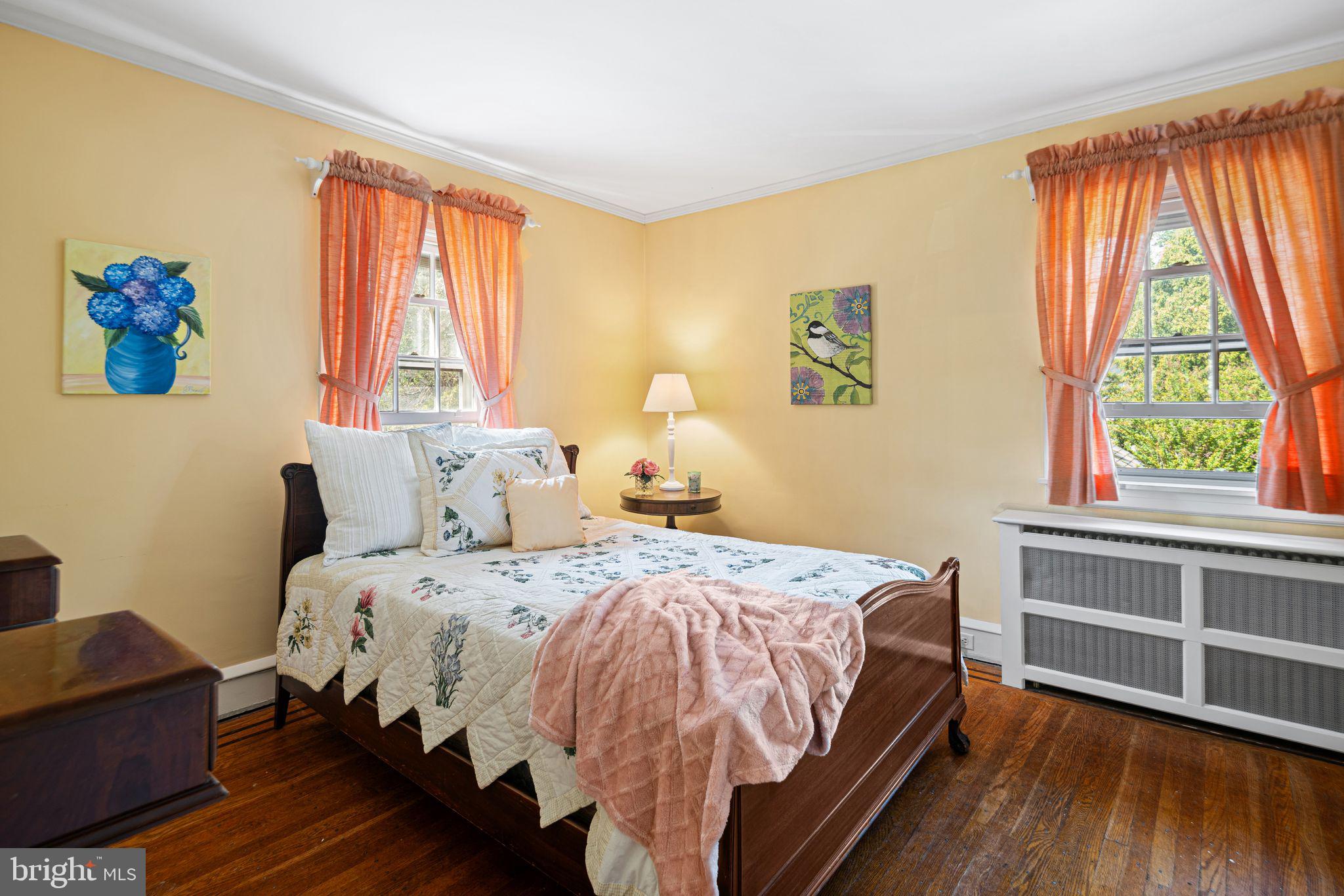 223 Hopkins Road Haddonfield, NJ 08033 - Photo 34 of 51 a bed sitting in a bedroom next to a window