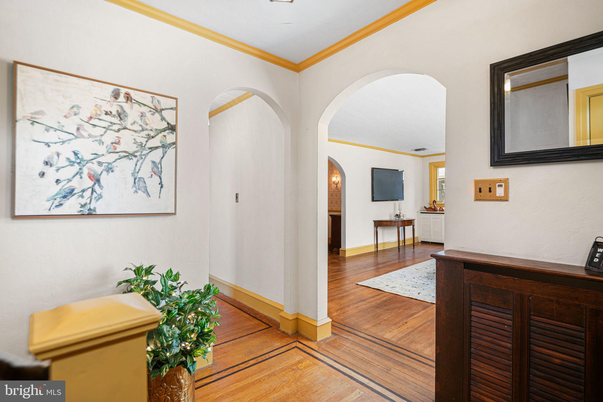 223 Hopkins Road Haddonfield, NJ 08033 - Photo 4 of 51 a view of a hallway to a livingroom with furniture