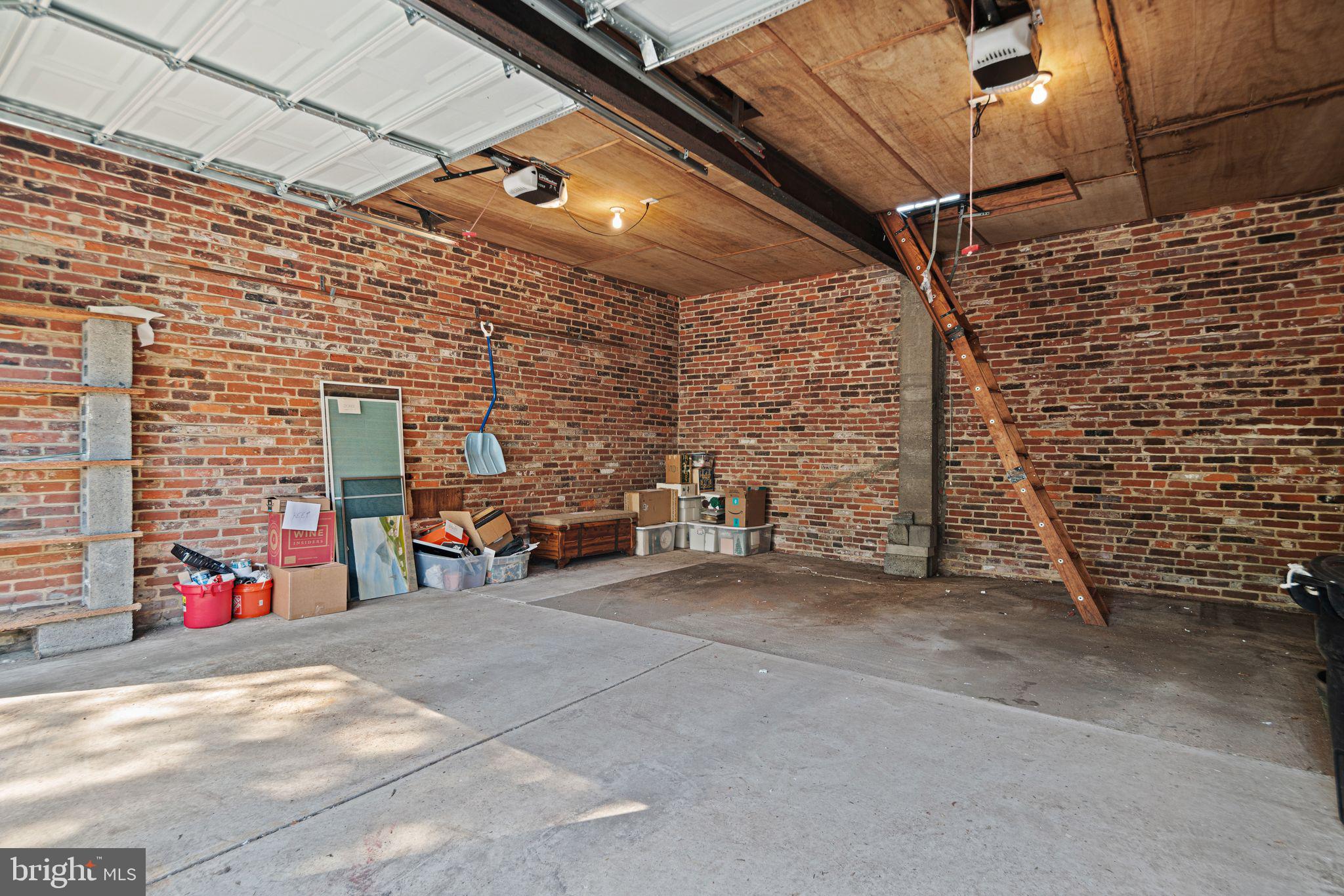 223 Hopkins Road Haddonfield, NJ 08033 - Photo 47 of 51 a view of a garage with parked cars