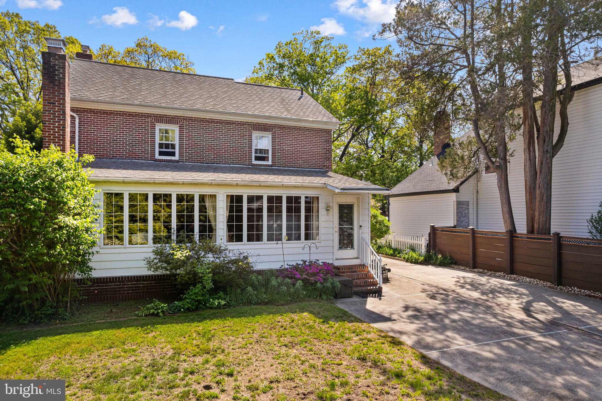 223 Hopkins Road Haddonfield, NJ 08033 - Photo 50 of 51 a front view of a house with garden