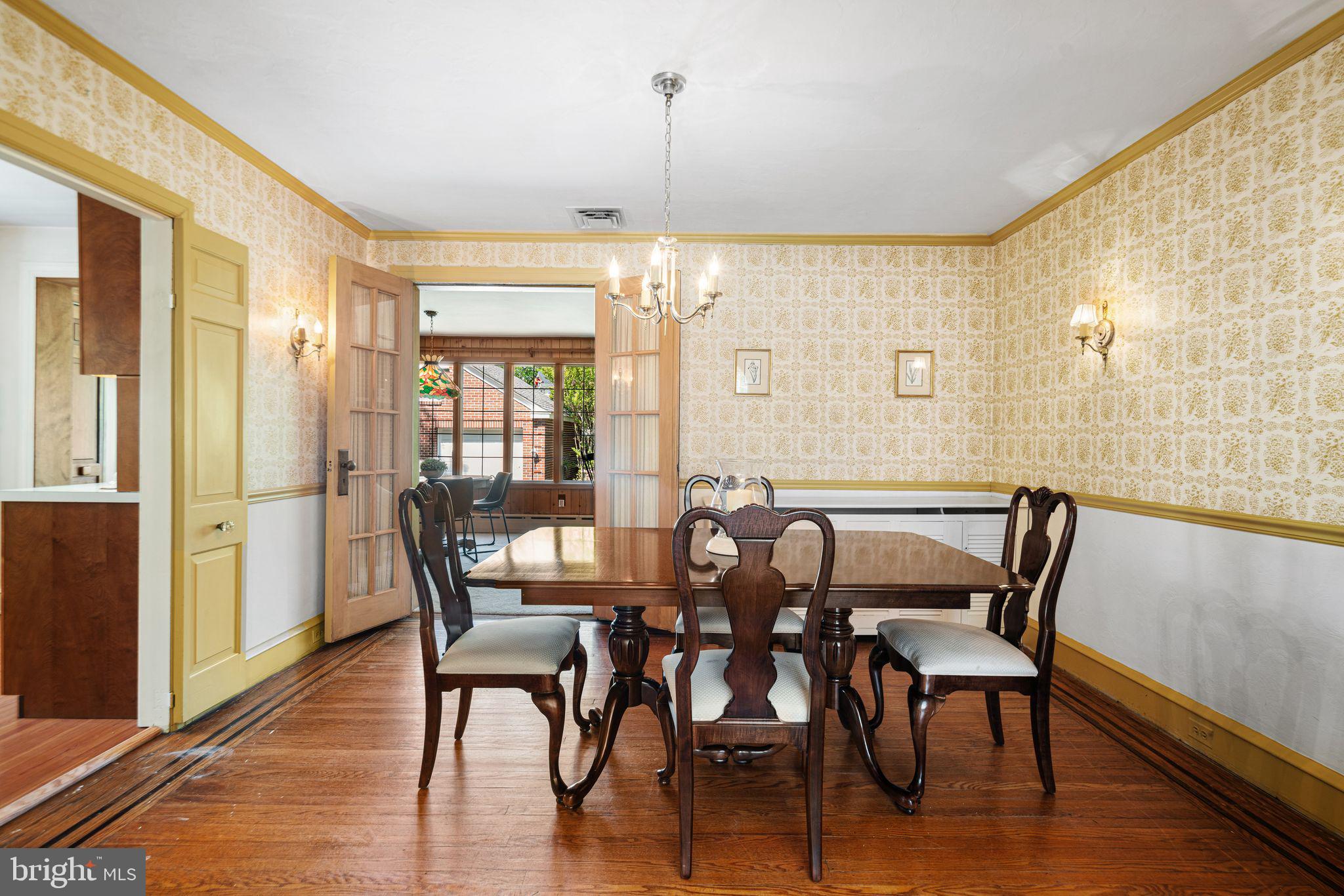 223 Hopkins Road Haddonfield, NJ 08033 - Photo 9 of 51 a view of a dining room with furniture window and wooden floor