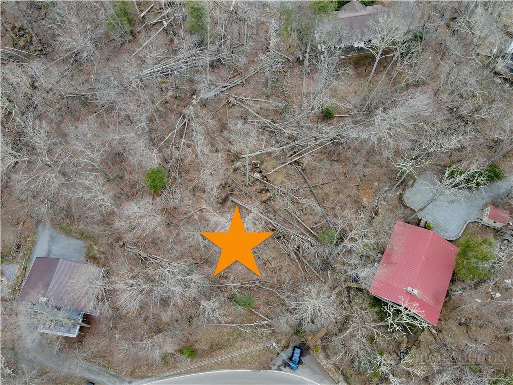 218 Lake Road Beech Mountain, NC 28604 - Photo 10 of 10 a aerial view of a house with a yard and lake view