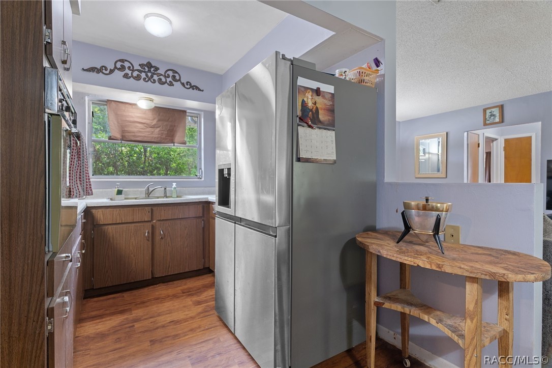 3355 South Highlands Avenue Inverness, FL 34452 - Photo 12 of 30 a kitchen with a table and chairs
