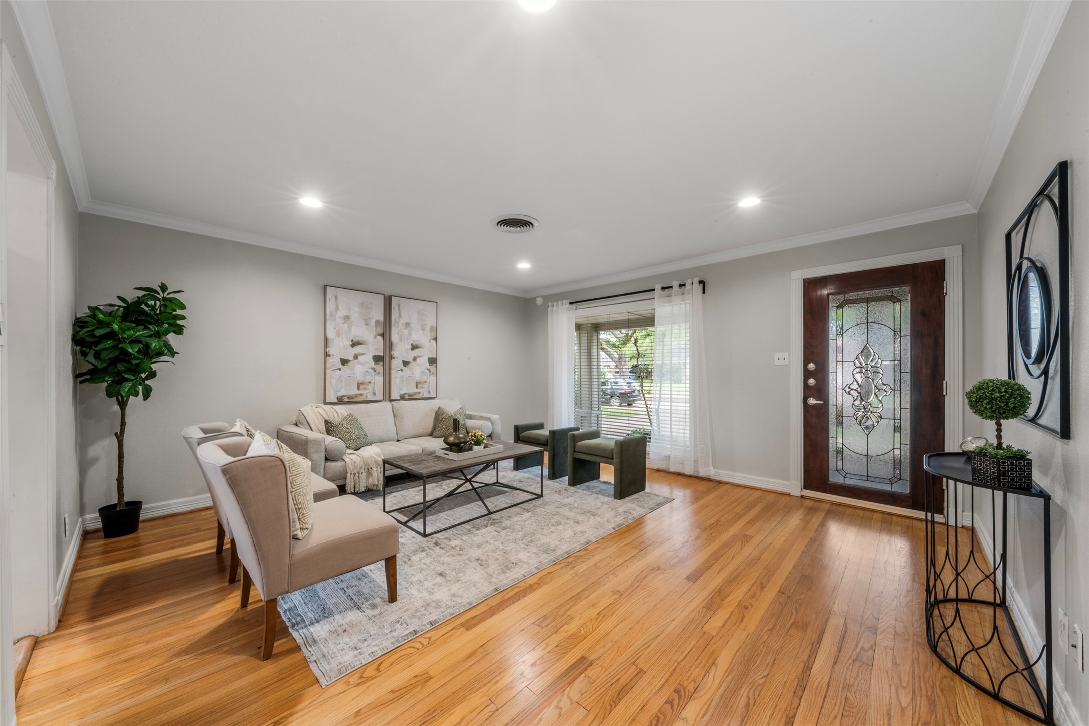 4307 Spellman Road Houston, TX 77035 - Photo 2 of 31 Original hardwood floors that have been refinished, and fresh paint welcomes you throughout the home.